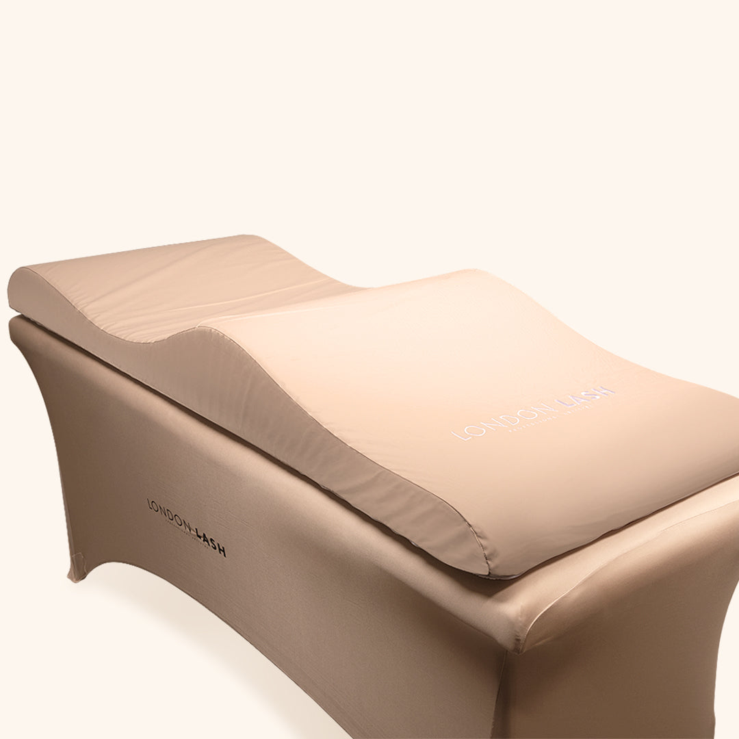 Beauty Bed Memory Foam Topper in beige color, ergonomic design for superior client comfort in salons