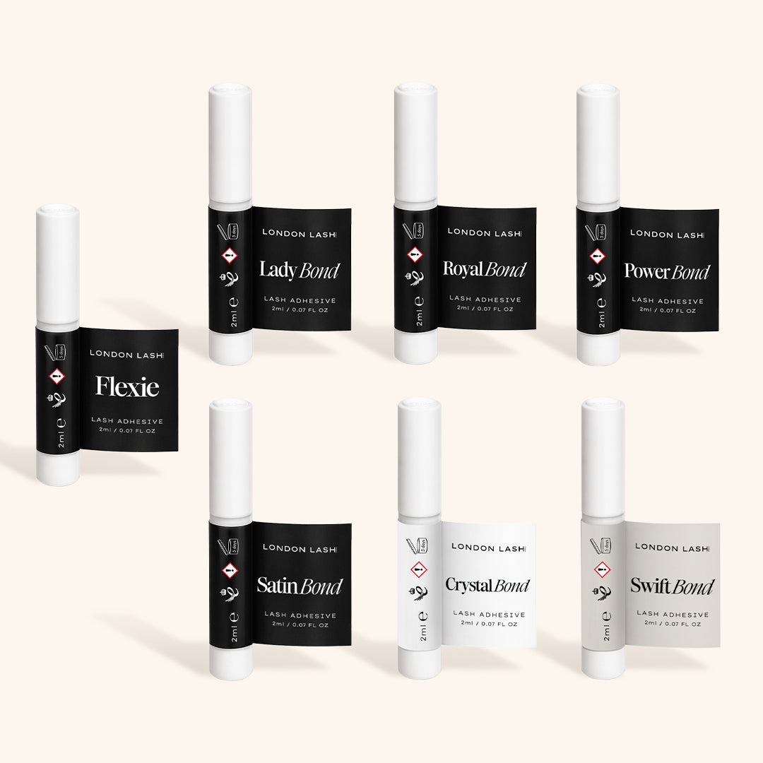 Collection of London Lash Eyelash Extension Glue Samples including various adhesives for lash extensions.