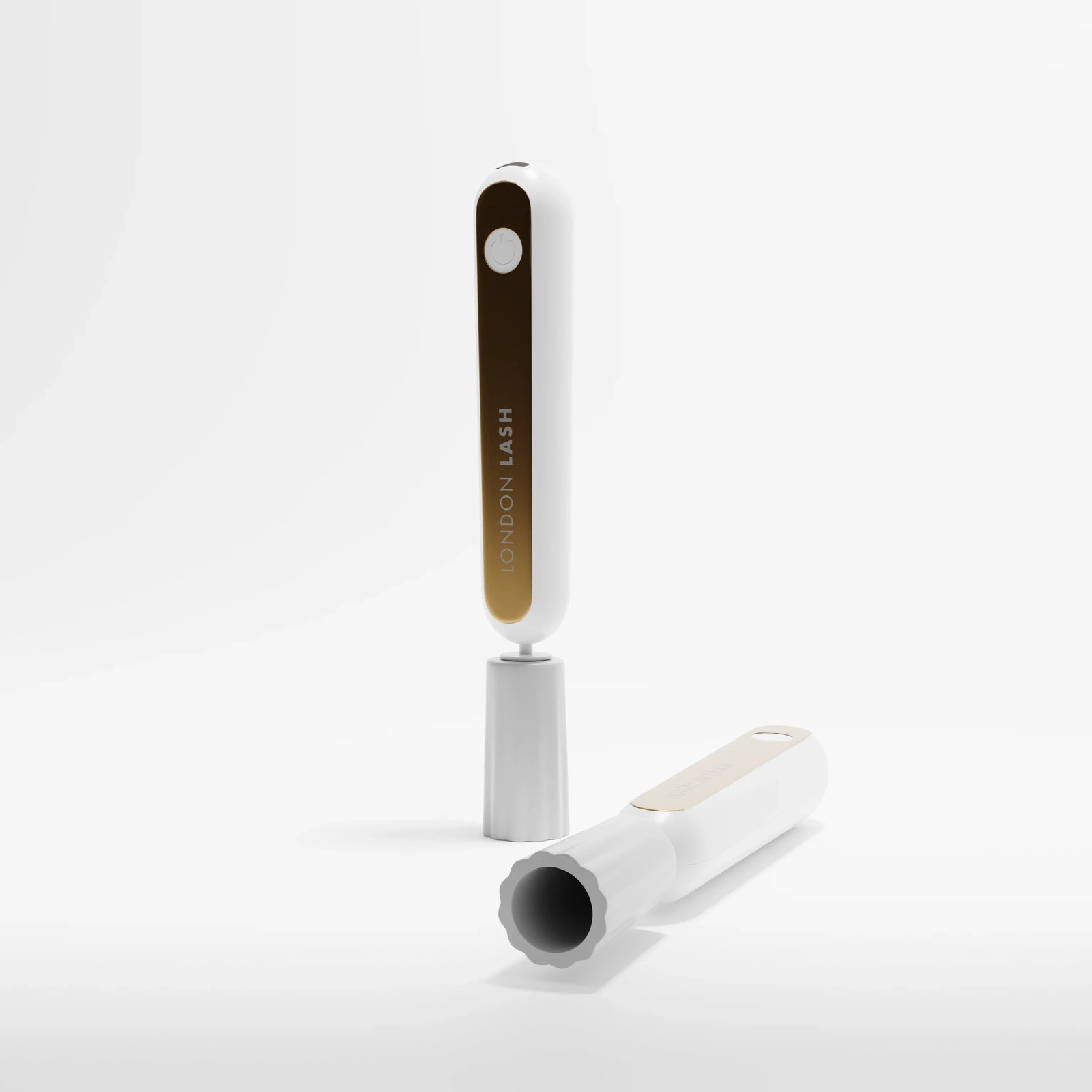 Eyelash extension glue shaker with 'London Lash' branding on a white background