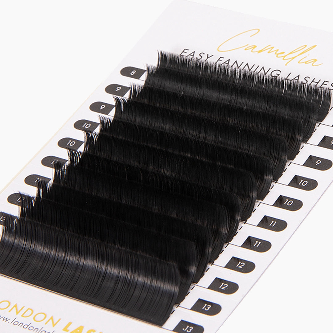 Close up of London Lash Camellia 0.07 lash strips on a white background