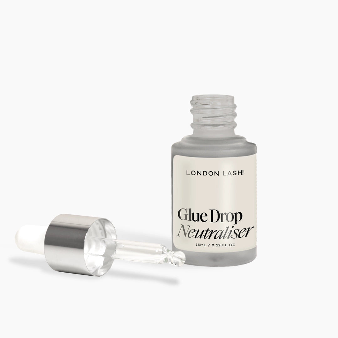 Opened bottle of London Lash Glue Drop Neutraliser on a white background