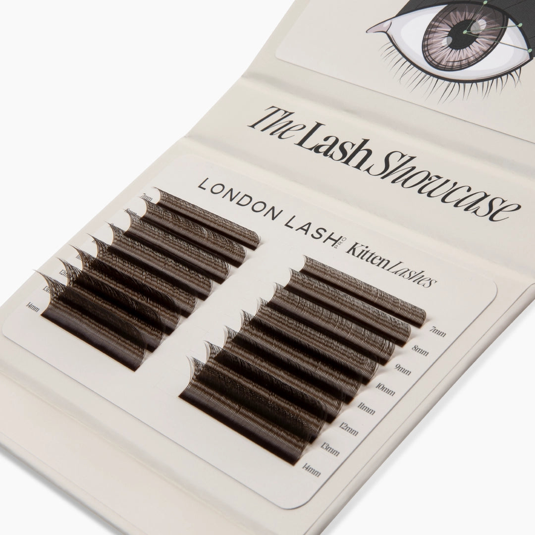 Angled top view of the open London Lash Showcase palette featuring organized rows of brown Kitten Lash extension strips from 7mm to 14mm