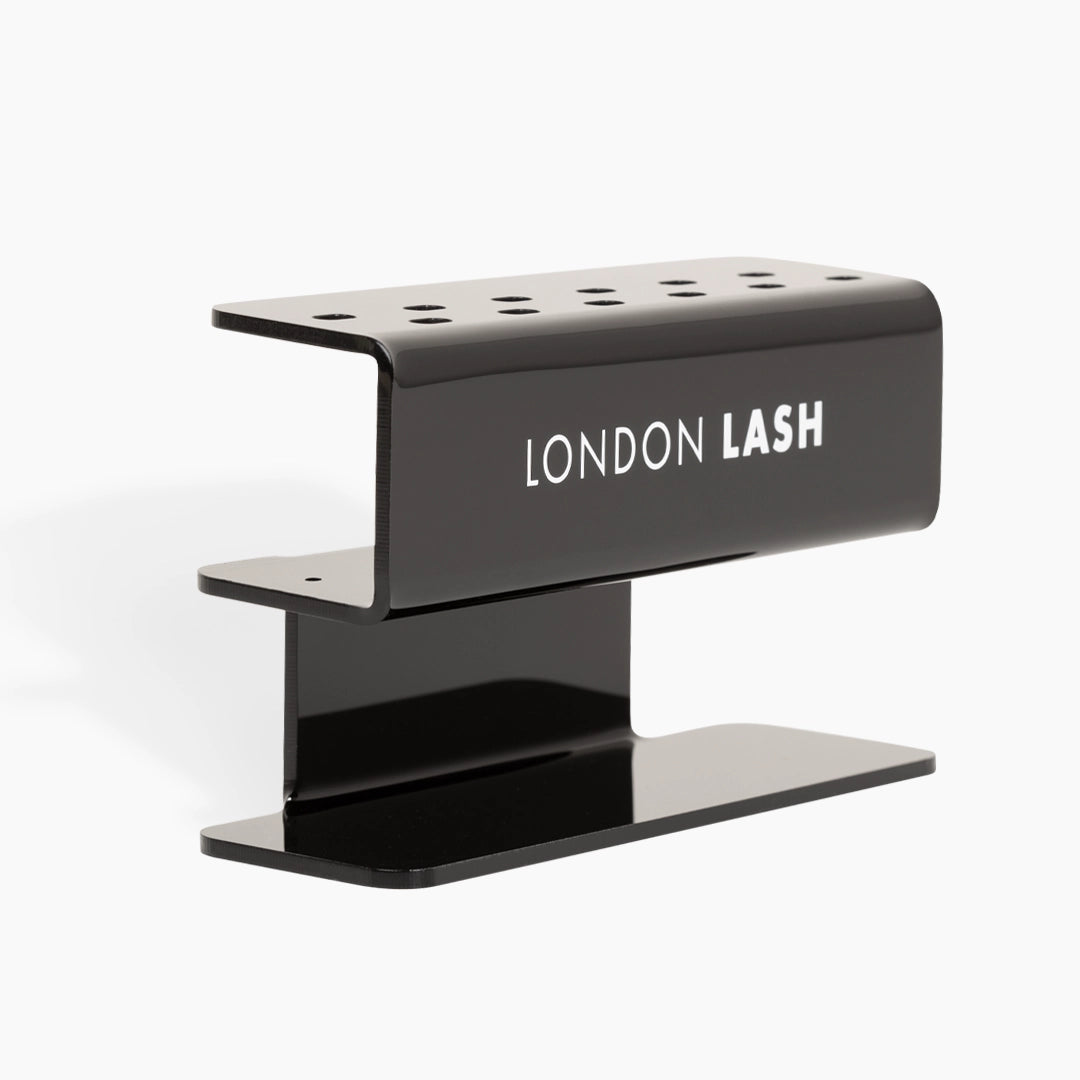 Black Lash Display Stand with 'London Lash' branding on a white background