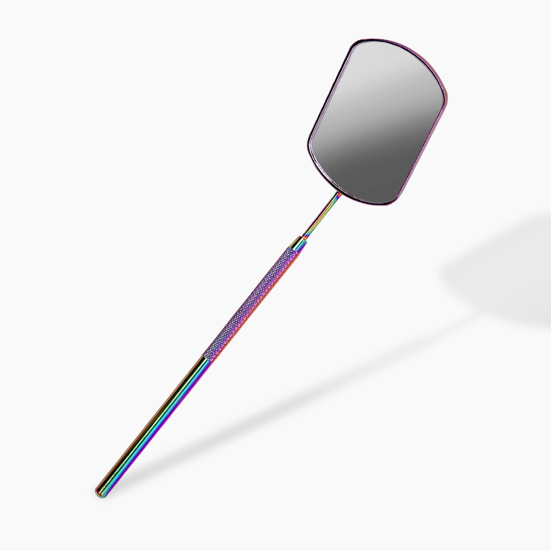 lash mirror with a colorful handle on a white background