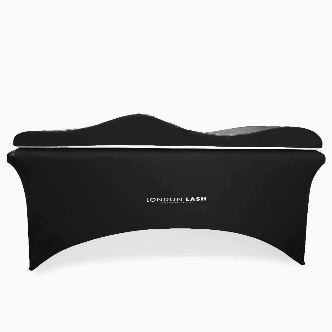 Black eyelash extension Beauty Bed Memory Foam Topper with 'London Lash' branding on a white background